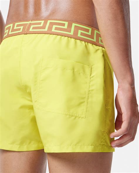 versace yellow swim shorts